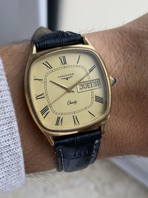 Reloj vintage Longines de cuarzo con fecha y día